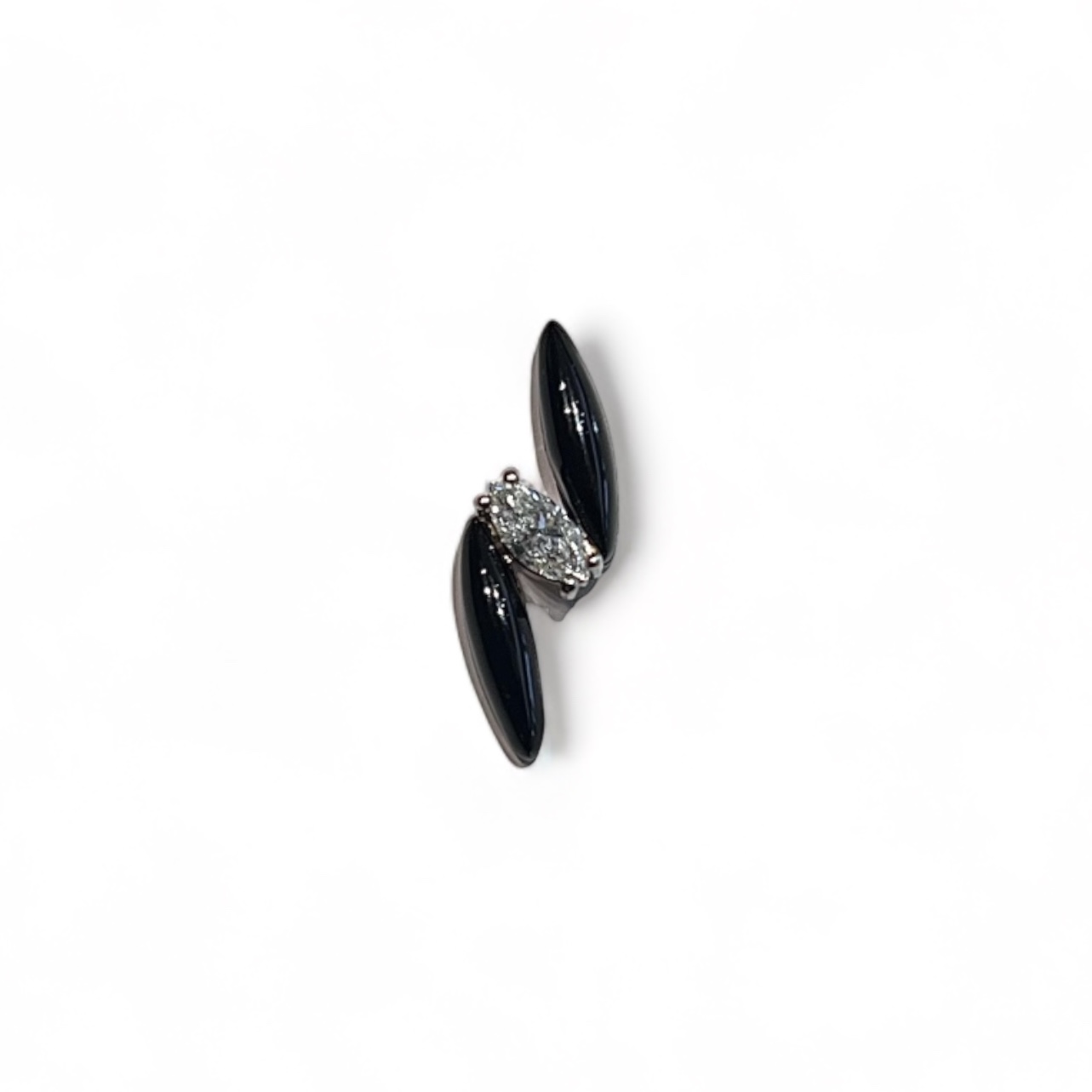 Earring with marquise cut diamond.